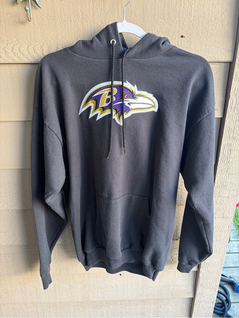 Port and Company Black Hoodie with Purple and Gold Ravens Logo